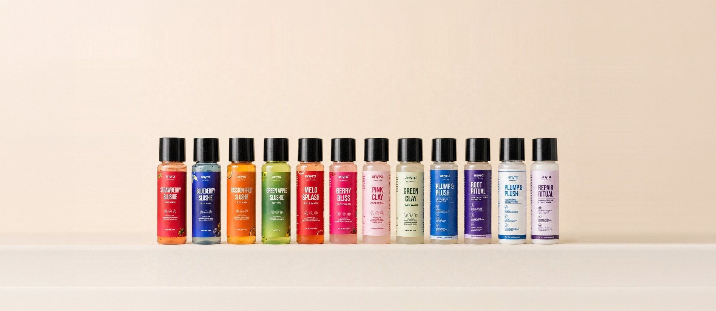 All twelve Anyra minis in a row: four Slushie body washes, four face washes, two shampoos and two conditioners
